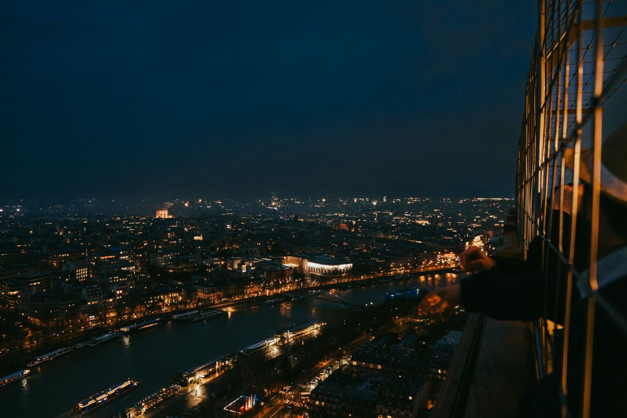 Paris city lights seen from the Eiffel Tower at night