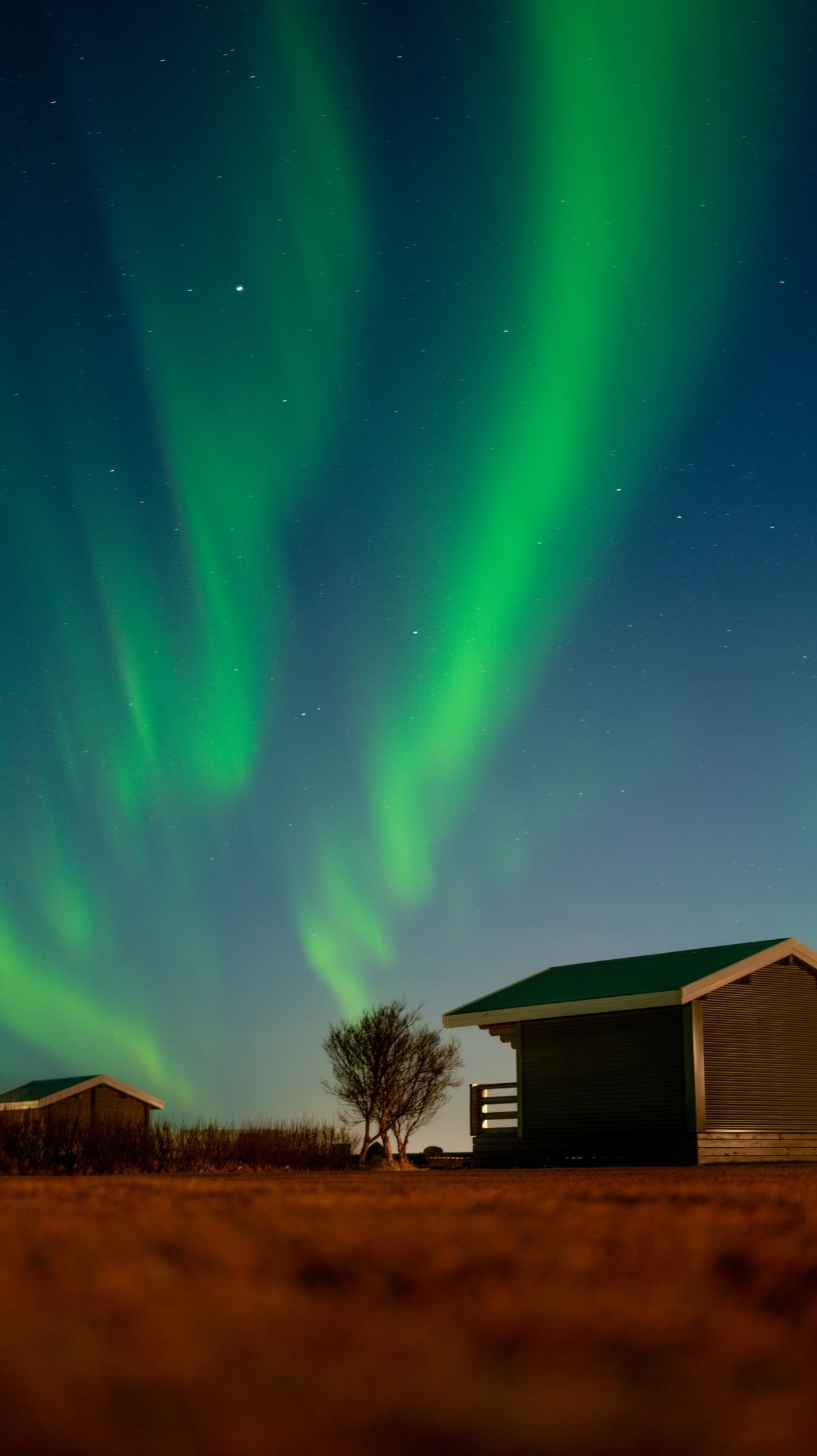 Aurora borealis illuminating the night sky over Iceland